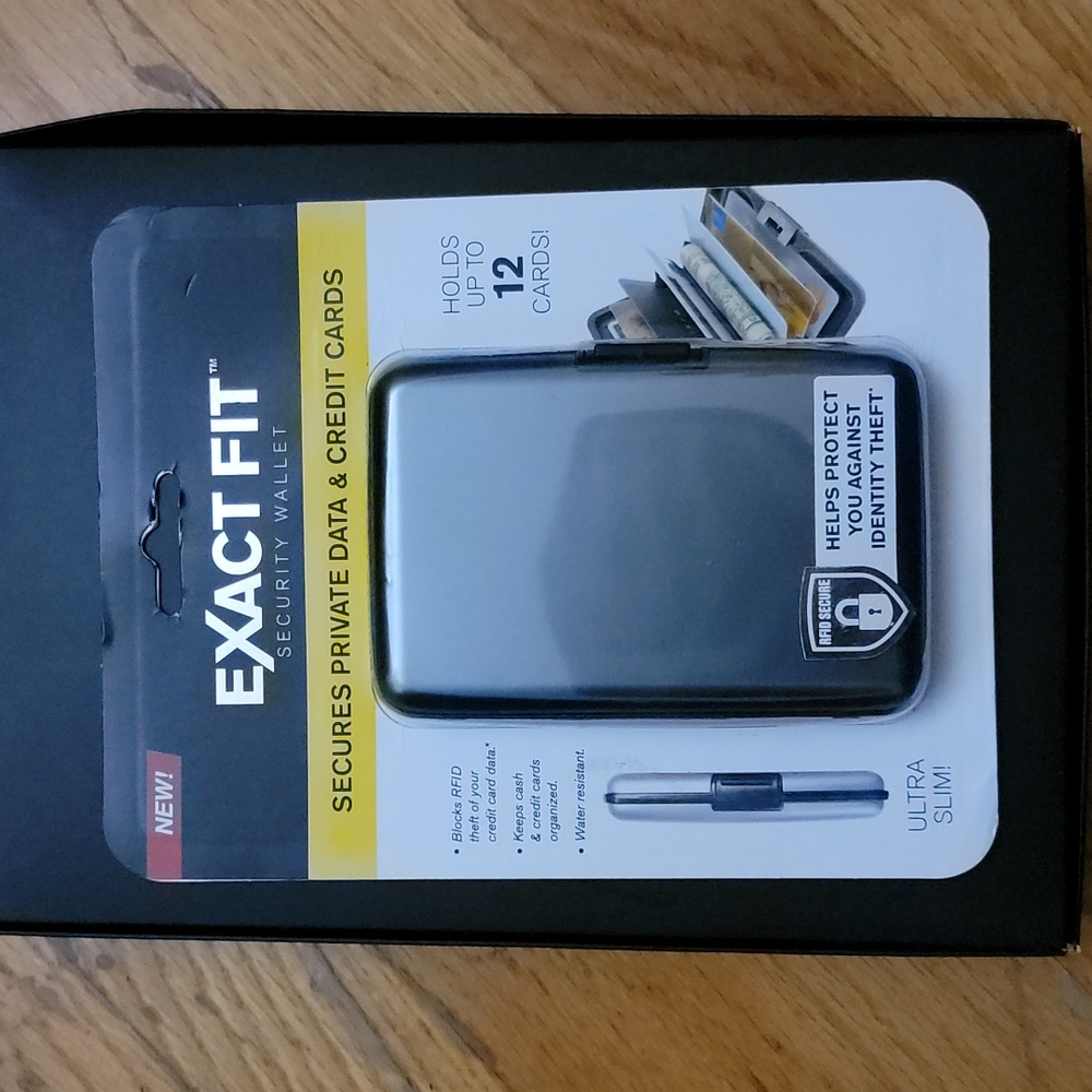 Nwt wallet metallic grey in color